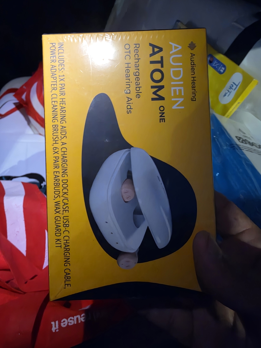 Atoms Audien ATOM ONE Yellow Box with White Charging Case and Beige Earbuds